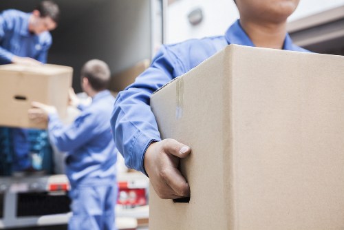Customer placing items into a secure storage unit at the start of a service agreement