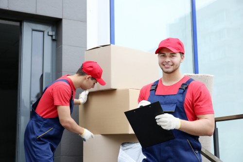 Professional movers handling items in an urban Camdentown area