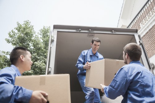 Manager reviewing site safety procedures in a storage area