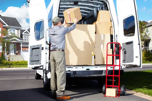 Packed boxes and furniture ready for storage